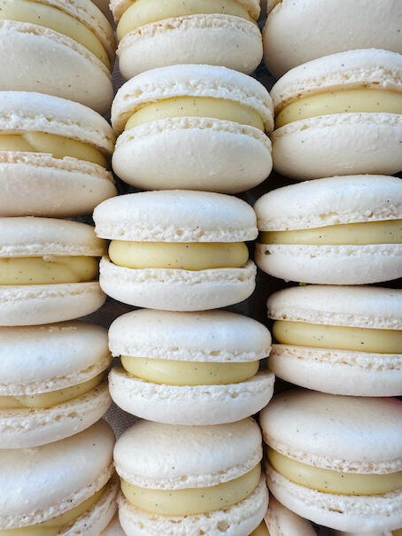 Vanilla Macarons with the Finest Belgian White Chocolate and Madagascar Vanilla Beans.